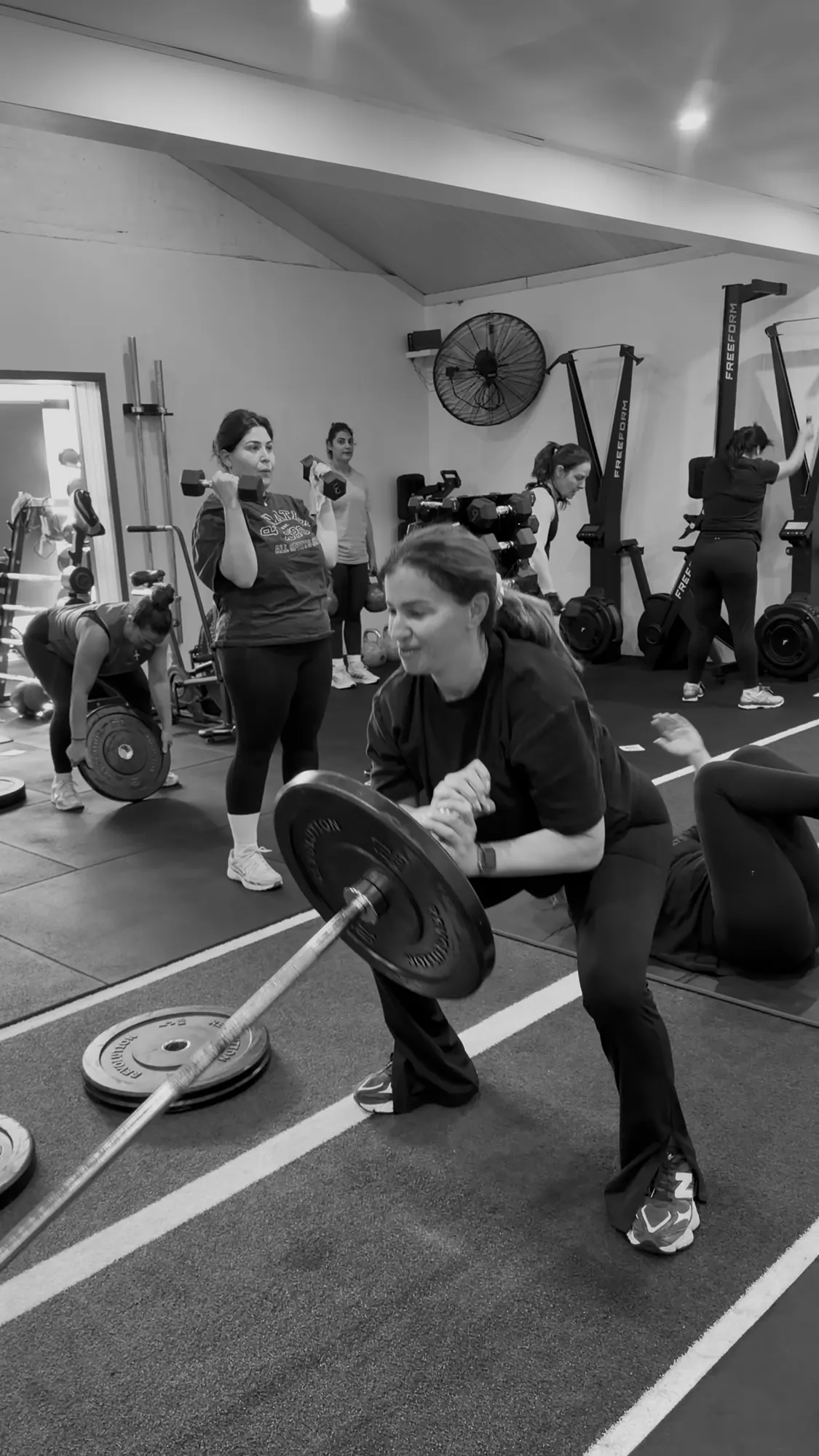 LNPT members work through a strength exercise in the studio.